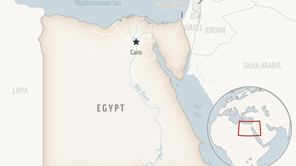 Train crashes into traffic in Egypt and kills 2, official says