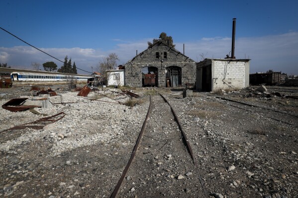 the abandoned qadam train station, damaged during the war between rebel forces and ousted president bashar assad's forces, is seen in damascus, syria, monday, jan. 13, 2025. (ap photo/omar sanadiki)